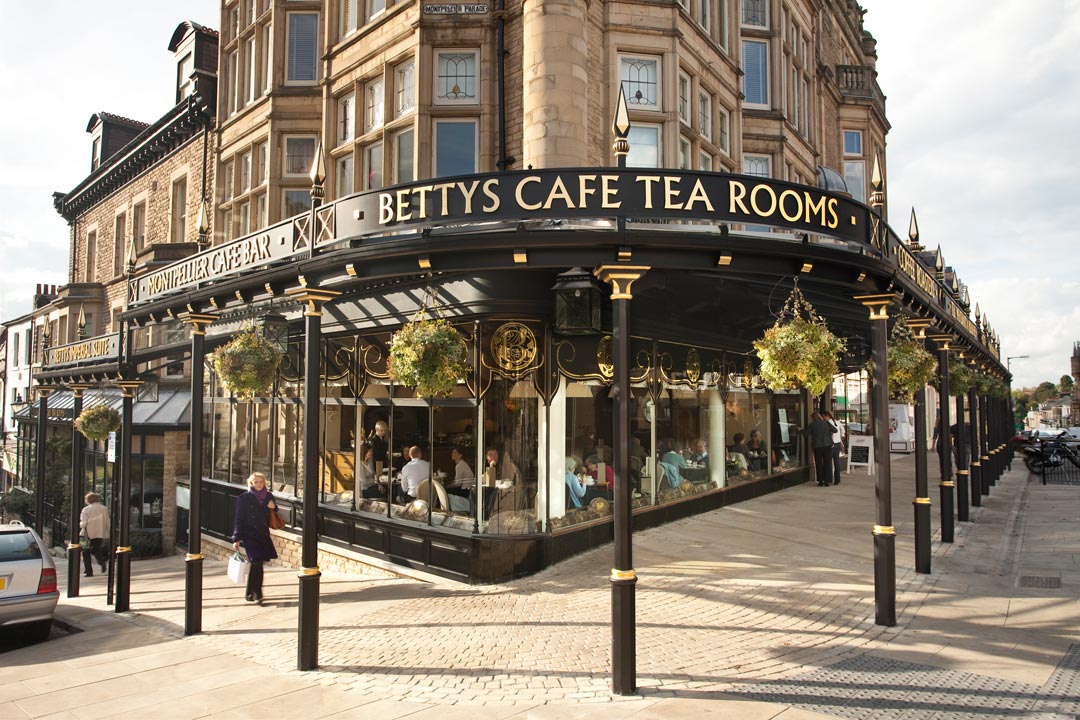 Bettys Cafe and Tea Rooms, Harrogate Bettys Cafe and Tea Rooms in central Harrogate. With its ornate hanging baskets and distinctive black and gold style.
