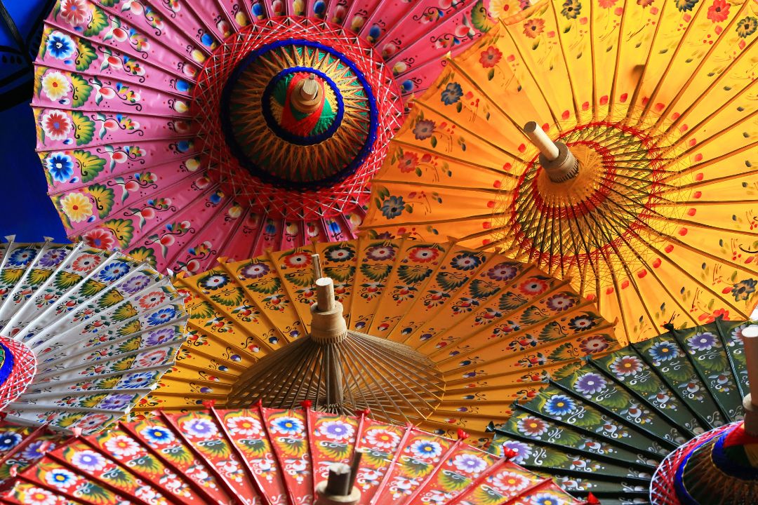 Umbrellas at Bo Sang Close up of paper umbrellas with intricate floral paint designs