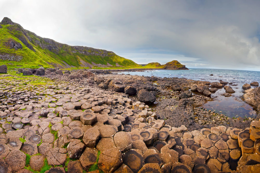 Panoramic view at the rocky coastline of the Giant’s Causeway in Northern Ireland.