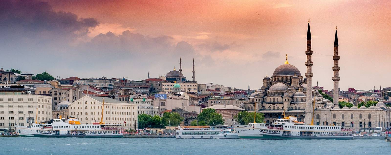 Istanbul city skyline from the Bosphorus Strait with Hagia Sophia Grand Mosque in the foreground