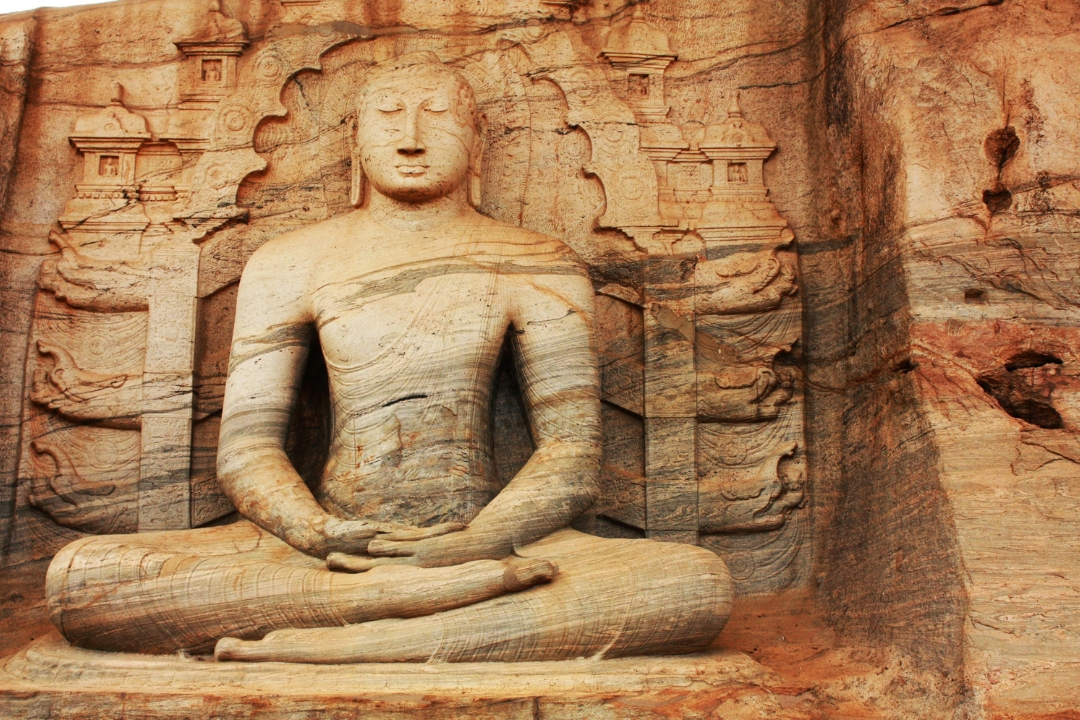 The Gal Vihara complex, Polonnaruwa A large sitting buddha is carved out of the granite rock face