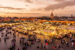 Place Jemaa el-Fnaa, the main square in the heart of the old medina lit up at night