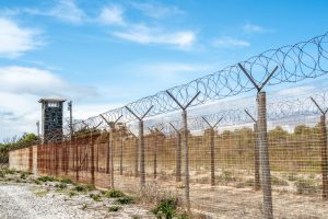 Double barbed wire fence at maximum security prison on Robben Island where Nelson Mandela and other prisoners were held.