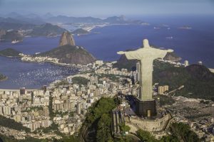 Christ the Redeemer statue overlooking Rio de Janeiro, with Sugarloaf Mountain, Guanabara Bay and the city spread below