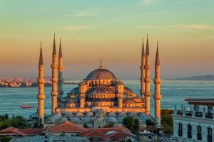 Blue Mosque glowing in the sunset, framed by its six minarets, Istanbul
