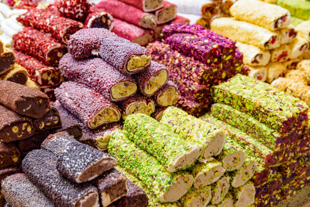 Turkish delight Colourful selection of Turkish delight coated with pistachios, chocolate and fruit, Istanbul
