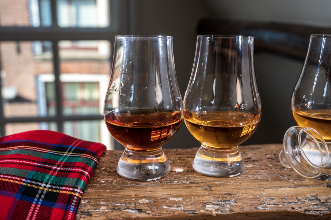 Whisky Tasting Glasses of Scotch whisky arranged for a tasting, Scotland